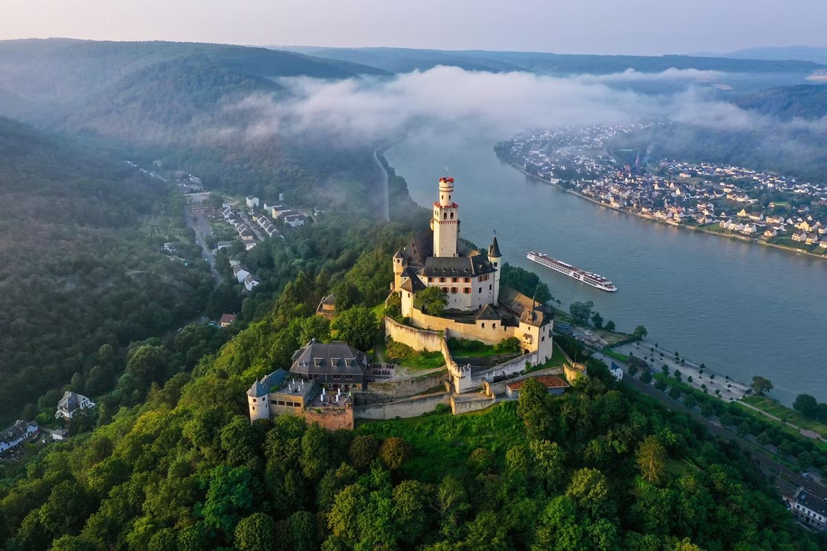 Viking river cruise passing a castle on the Rhine